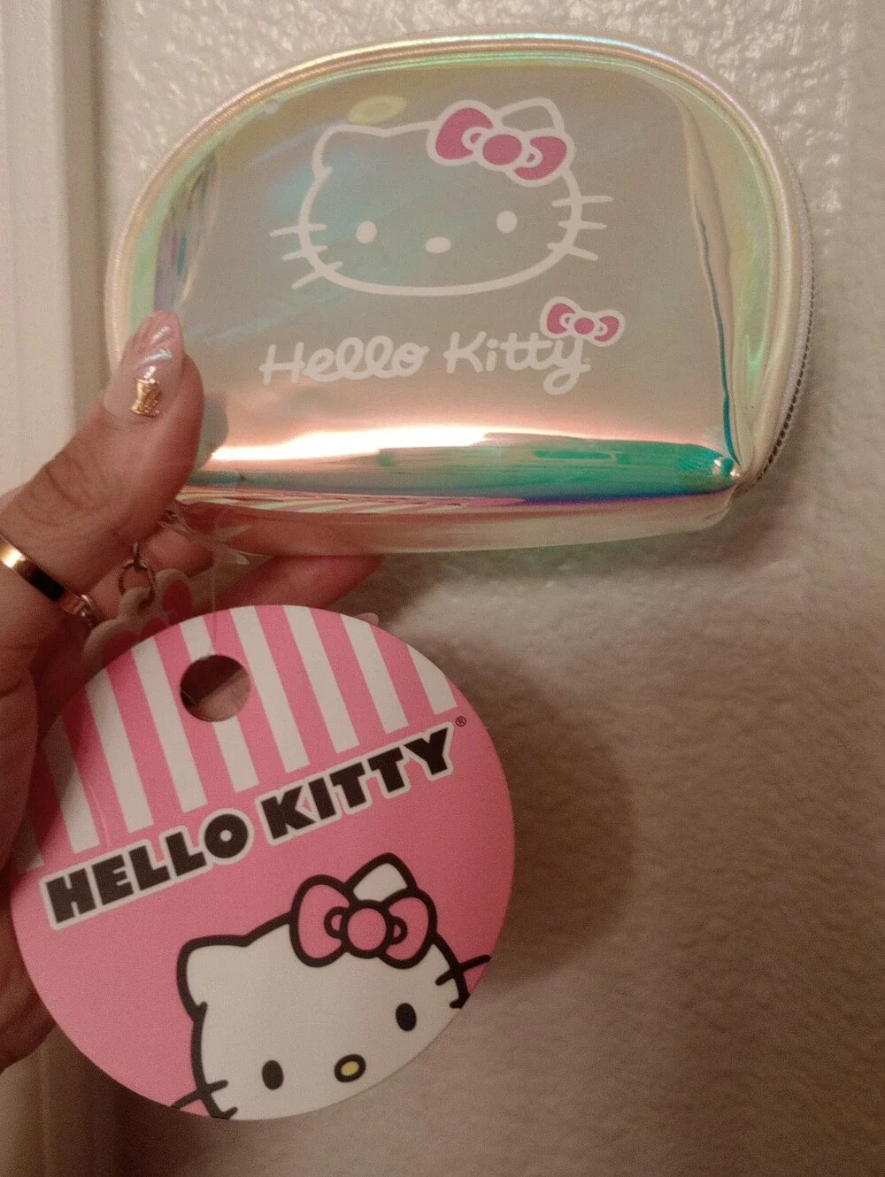Hello Kitty Iridescent Holographic Cosmetic Pouch with Pink Bow Zipper  Accent